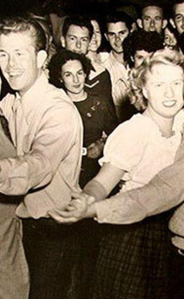 Old Photo of Two Couples Dancing at a Party